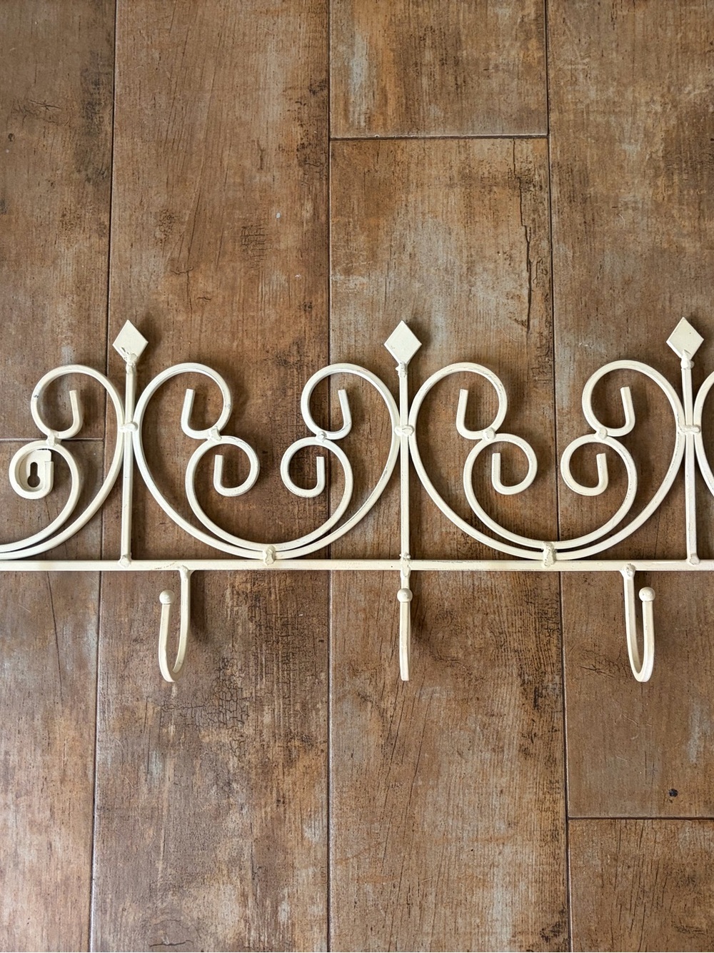 Cream Metal Wall Hook Rack with Decorative Scrolls Vintage